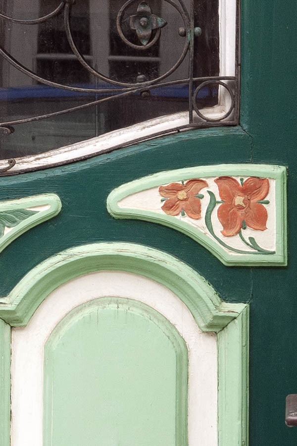 Photo 12194: Formed, carved, panelled, green, light green, white and red door with lattice