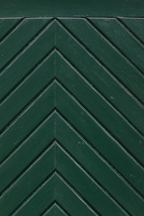 Photo 12259: Panelled, green door of board with top window