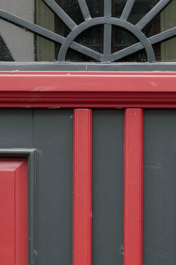 Photo 12344: Panelled, black and red double door with top window