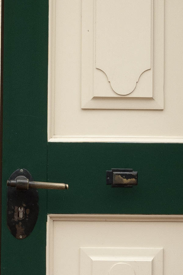 Photo 12360: Carved, panelled, green and white double door with top window