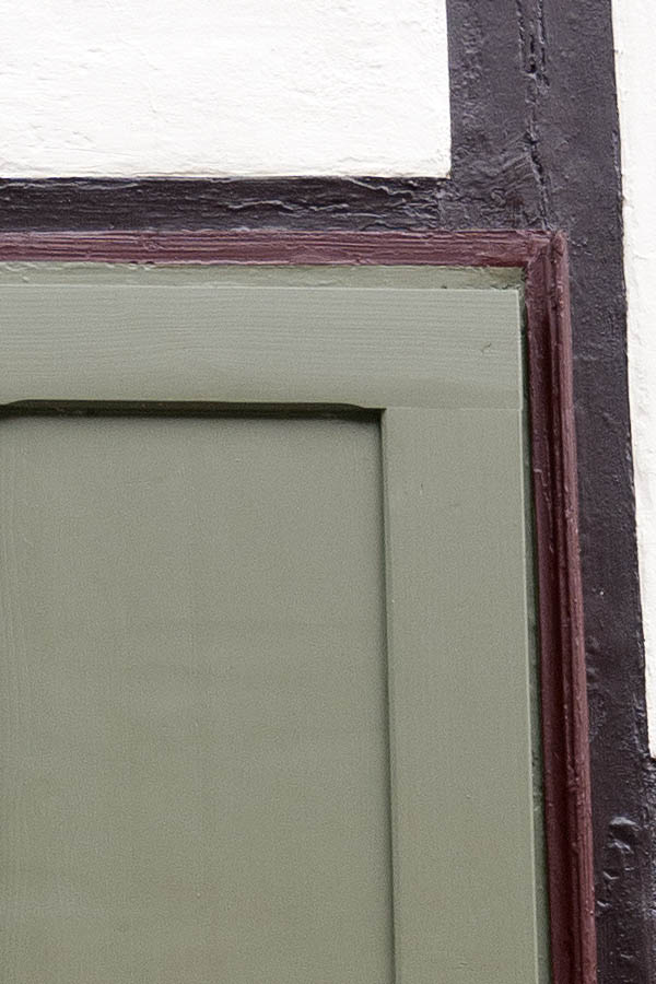 Photo 12369: Carved, panelled, brown-grey shutters