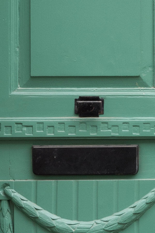 Photo 12392: Carved, panelled, light green double door