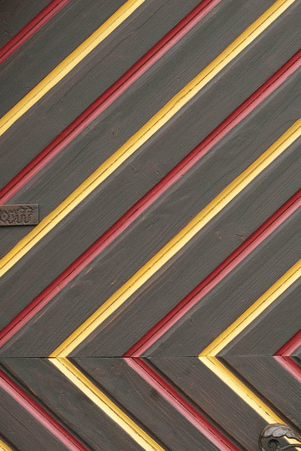 Photo 12432: Lopsided, brown, yellow and red gate