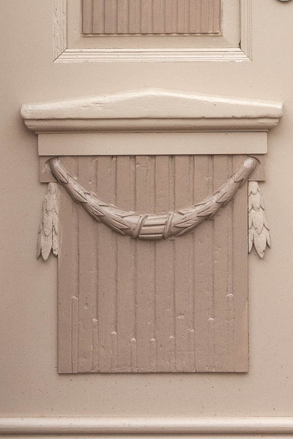 Photo 12452: Carved, panelled, light yellow and pink double door with top window