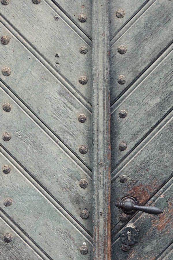 Photo 12467: Decayed, formed, light green double door made of planks