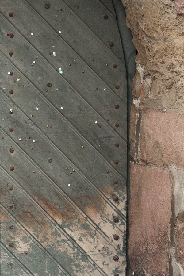 Photo 12470: Decayed, formed, light green gate made of planks