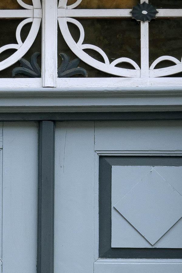 Photo 12472: Panelled, carved, light blue, green and white double door with top window