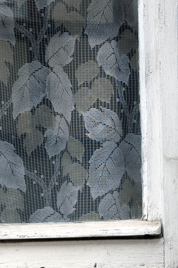 Photo 12482: Worn, white window with four panes