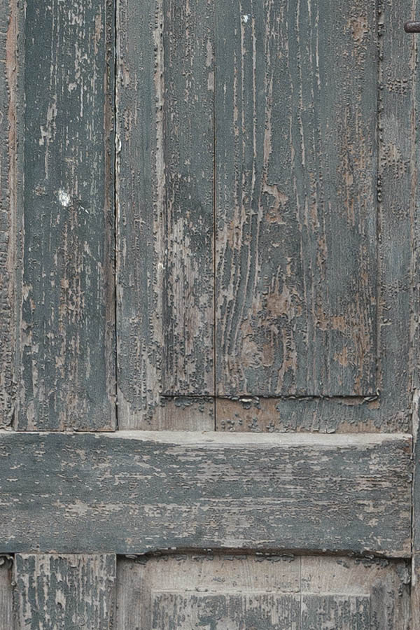 Photo 12484: Decayed, panelled, unpainted, green door