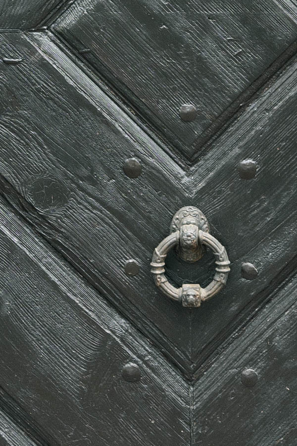 Photo 12491: Formed, black half-door made of planks with top window