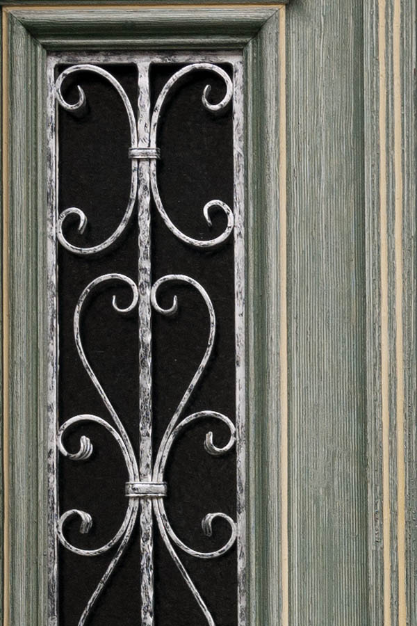 Photo 12651: Carved, panelled, green, yellow, blue and red double door with top window, door lights and lattice