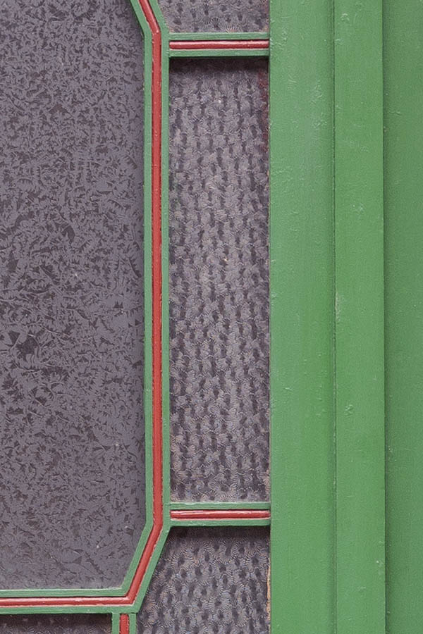 Photo 12657: Carved, panelled, green and red door with door lights