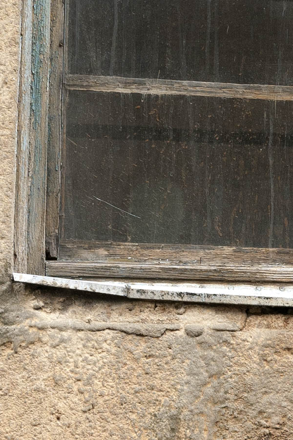 Photo 12807: Worn, teal window with four frames and seven panes