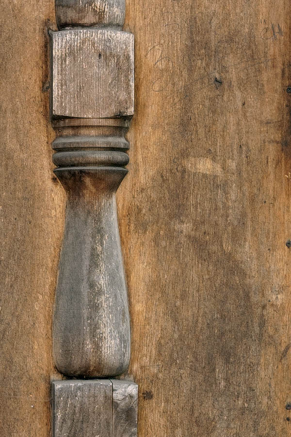 Photo 12901: Worn, carved, panelled, unpainted door