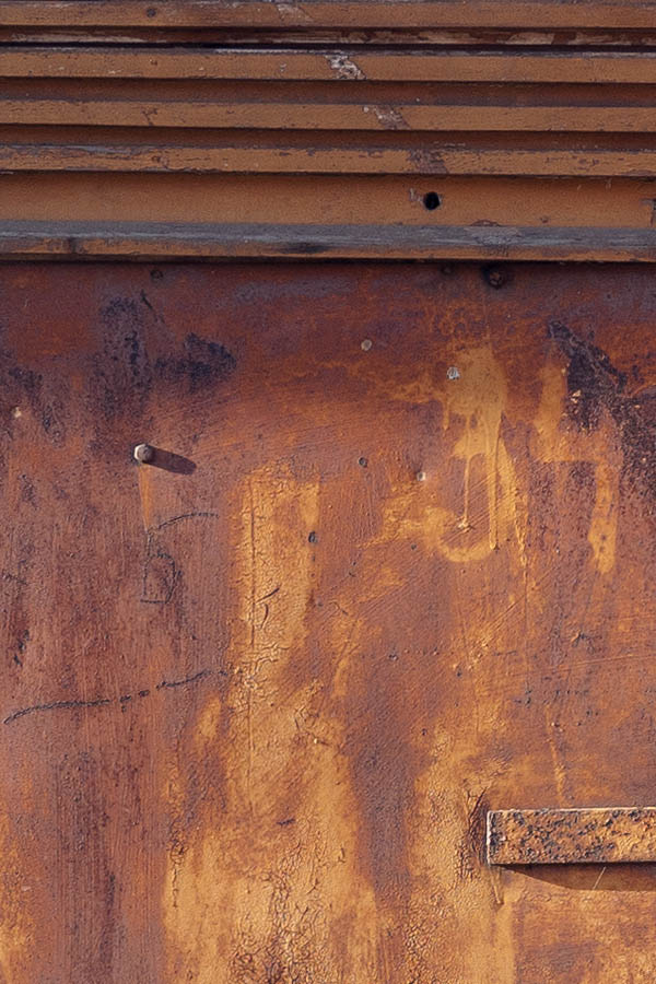 Photo 13020: Worn, red and brown, rusty metal gate