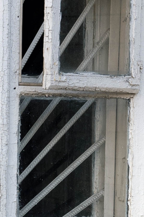 Photo 13076: Worn, white window with two frames and six panes