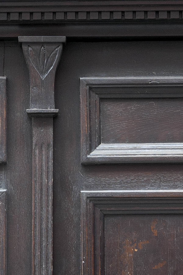 Photo 13586: Carved, panelled, brown double door with latticed fan light