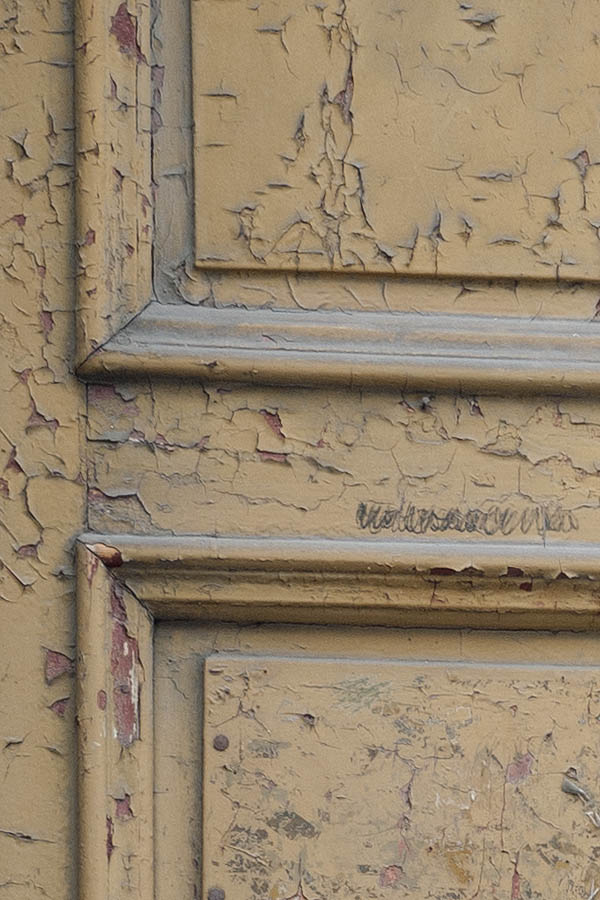 Photo 13687: Decayed, panelled, yellow and red double door with top window
