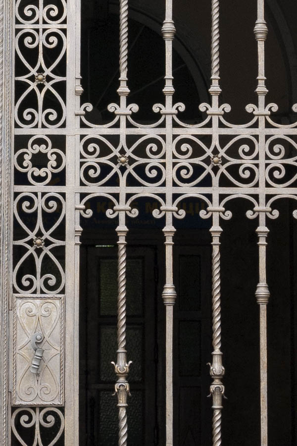 Photo 13795: Large, light grey, latticed gate with fan light