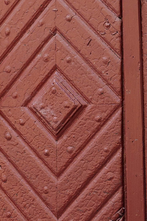 Photo 13899: Worn, panelled, red gate