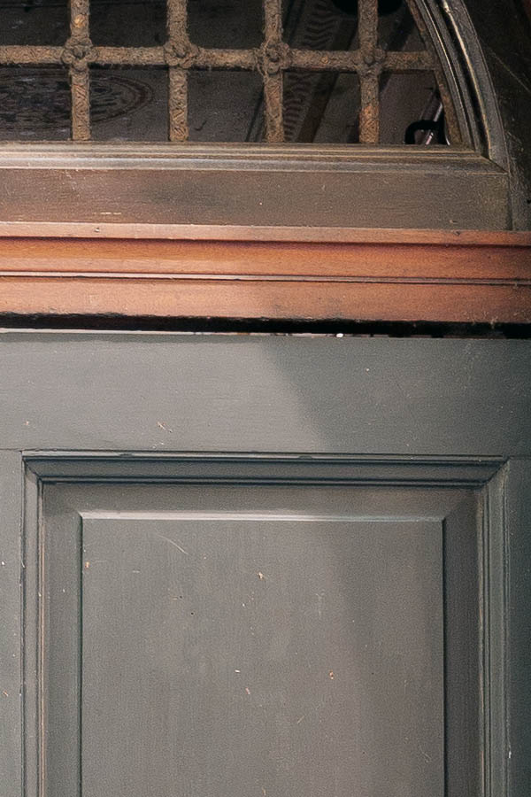 Photo 14927: Panelled, grey double door with barred fan light
