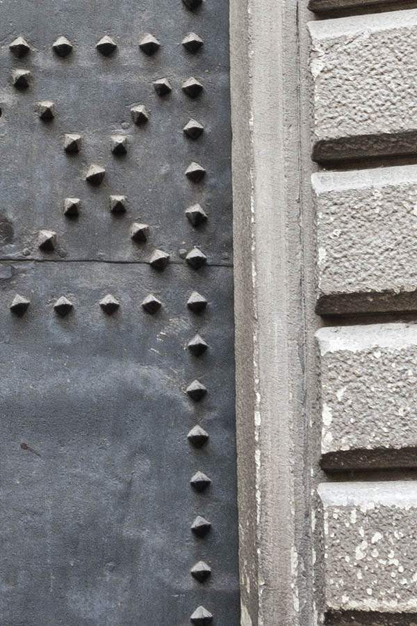 Photo 15015: Formed, black double door with metal plates and nails
