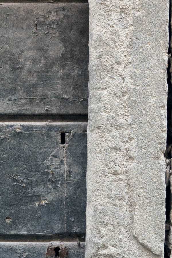 Photo 15066: Decayed, unpainted, black door made of planks