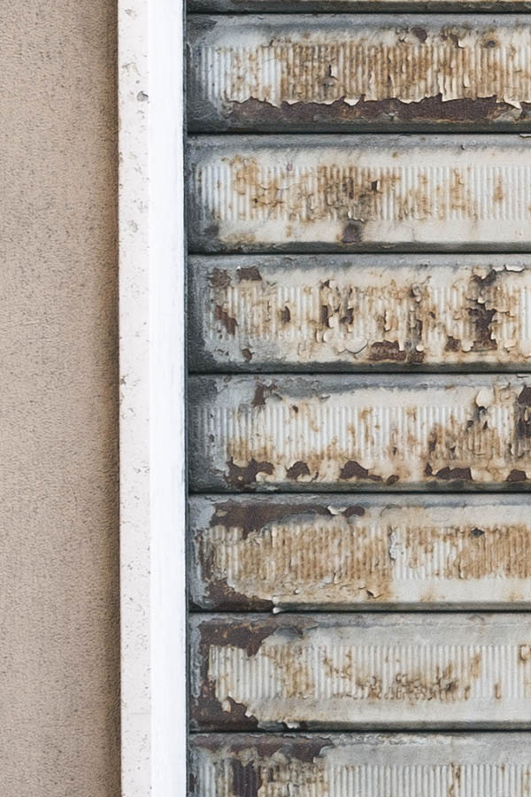 Photo 15112: Worn, grey security shutter