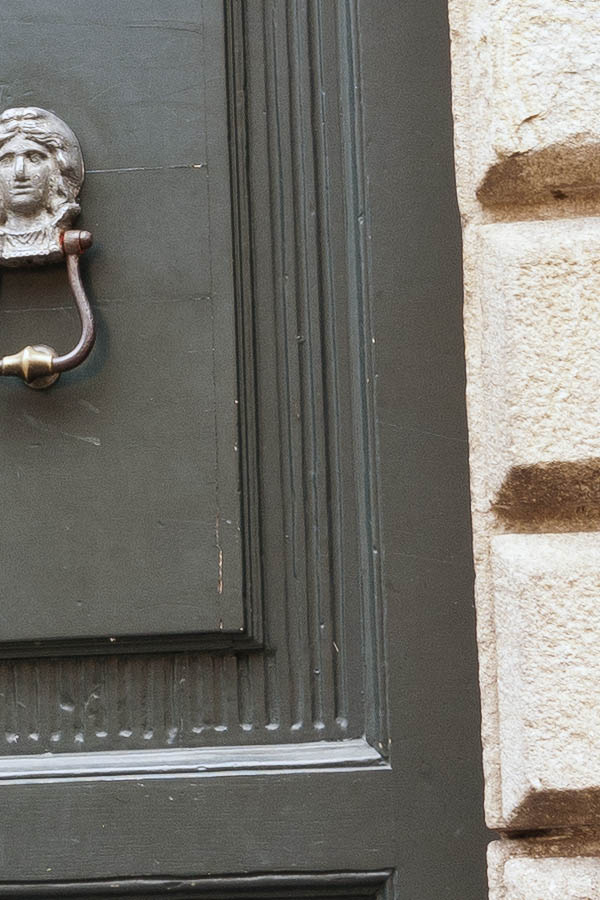 Photo 15222: Worn, panelled, carved, grey double door with latticed fan light