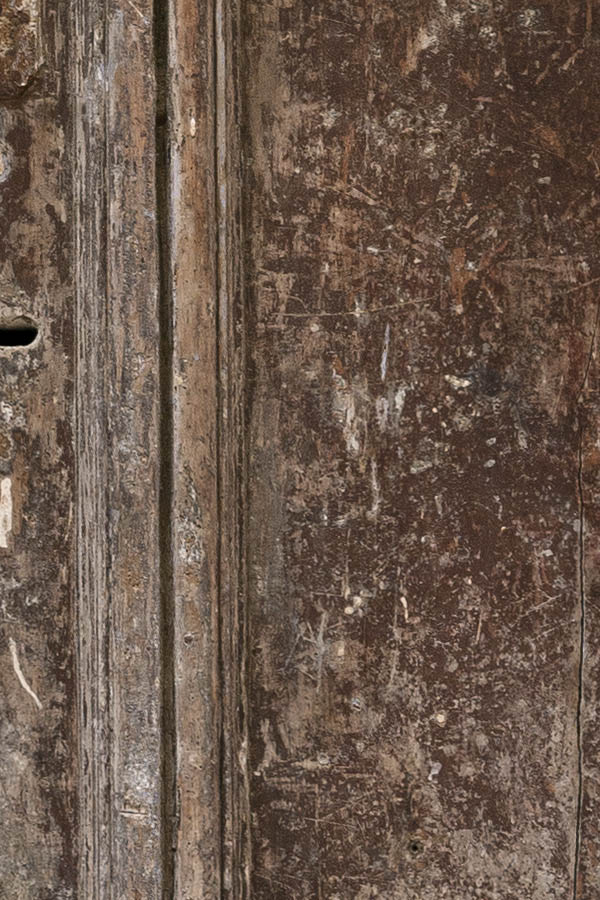 Photo 15396: Decayed, panelled, unpainted, brown door with latticed fan light
