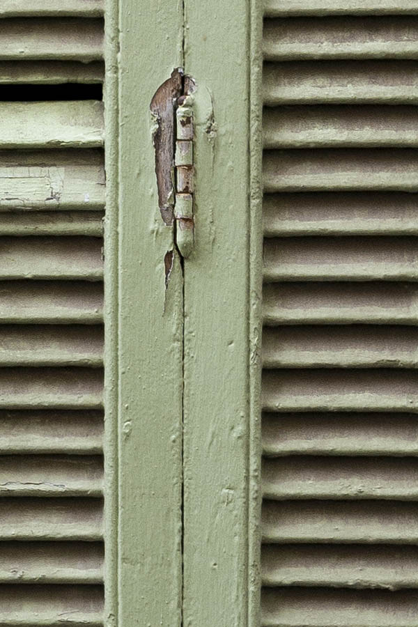 Photo 15440: Worn, light green folding shutters