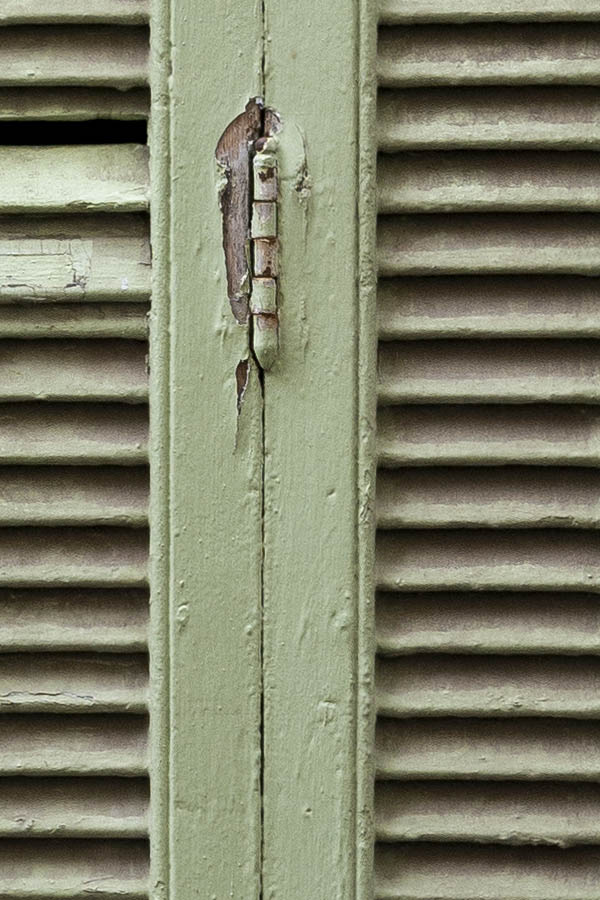 Photo 15440: Worn, light green folding shutters