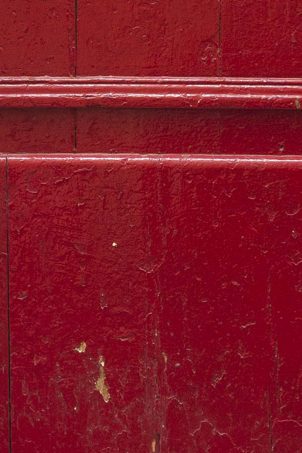 Photo 15475: Formed, panelled, red door with venthole