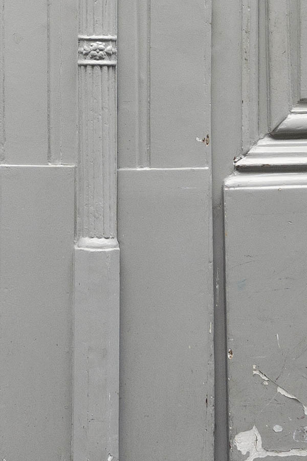 Photo 15632: Worn, formed, carved, panelled, light grey gate with minor doors