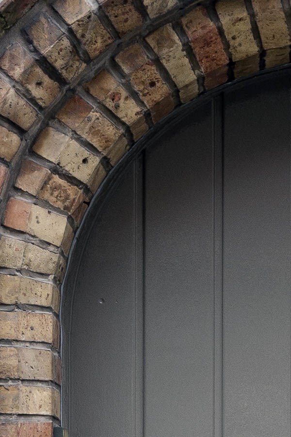 Photo 15666: Formed, grey door made of planks