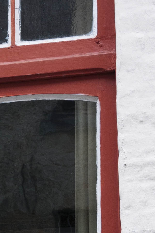 Photo 15700: Formed, red and white window with four frames and 10 panes