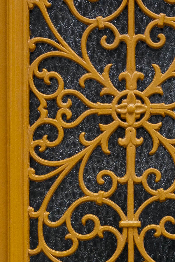 Photo 15794: Panelled, dark yellow door with top window and latticed door light