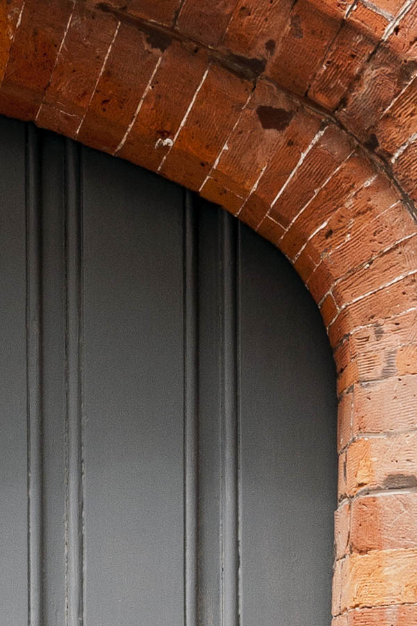 Photo 15822: Worn, formed, grey door made of planks