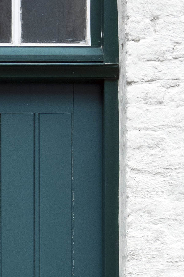 Photo 15842: Panelled, teal door with teal and white top window