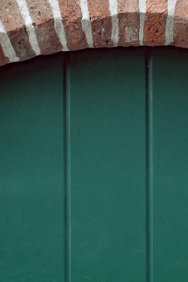 Photo 15934: Formed, green door made of planks
