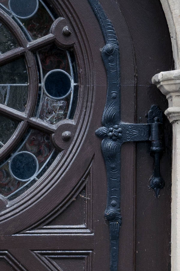 Photo 16275: Formed, panelled, brown door with round door light