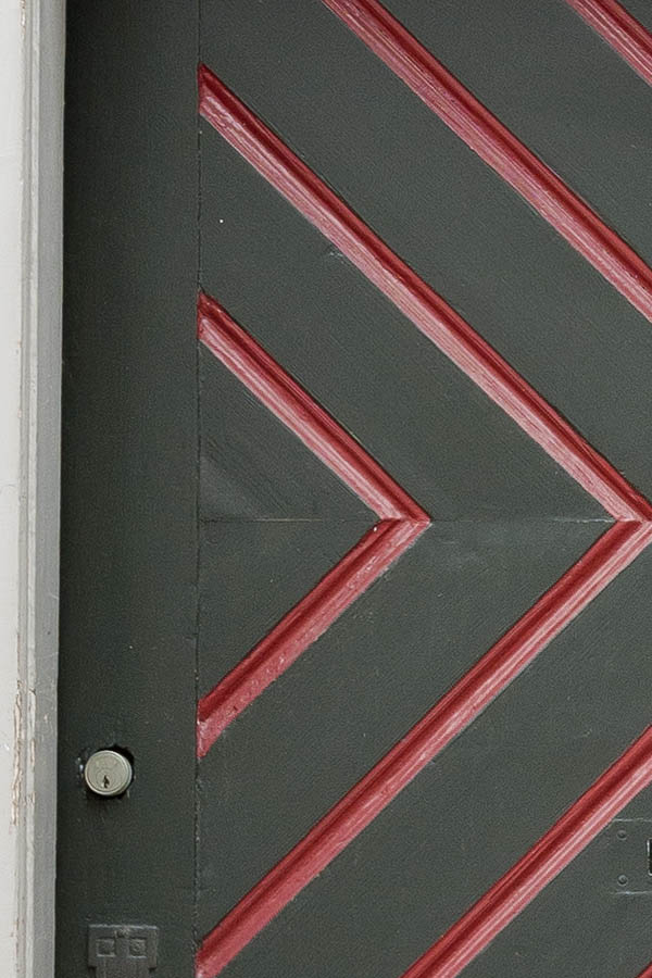 Photo 16308: Panelled, brown, red, grey and white door with top window