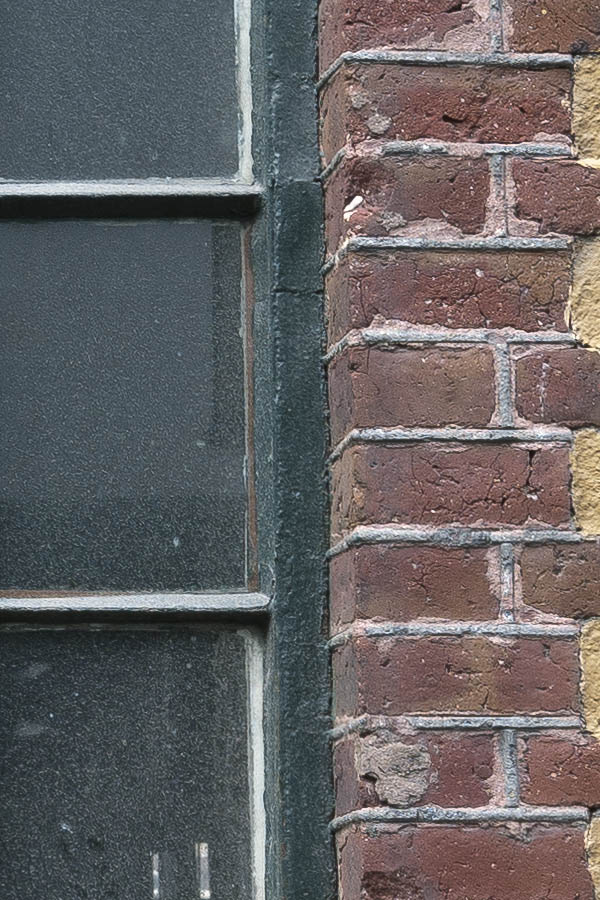 Photo 16636: Formed, green metal window with 20 panes