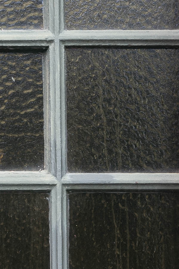 Photo 16675: Formed, grey, metal window with 15 panes