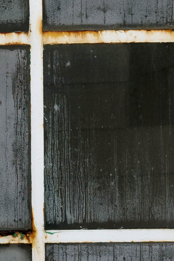 Photo 16991: Decayed, white metal window with 12 panes