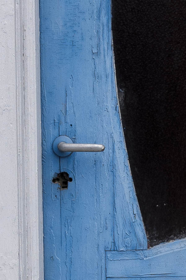 Photo 17195: Worn, formed, panelled, carved, blue door with door light