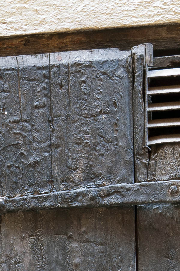 Photo 17738: Worn, unpainted shutters of board