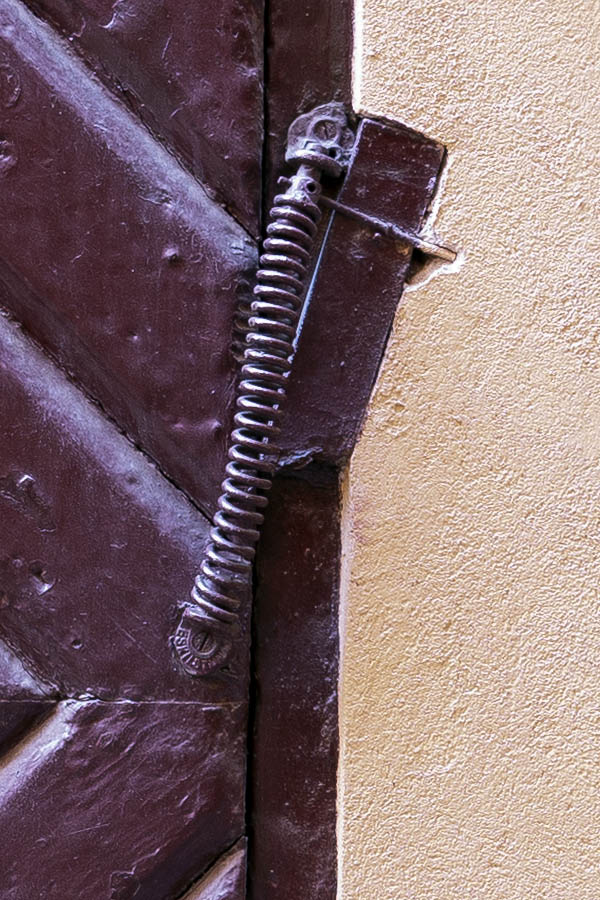 Photo 17739: Worn, purple door of diagonally mounted boards