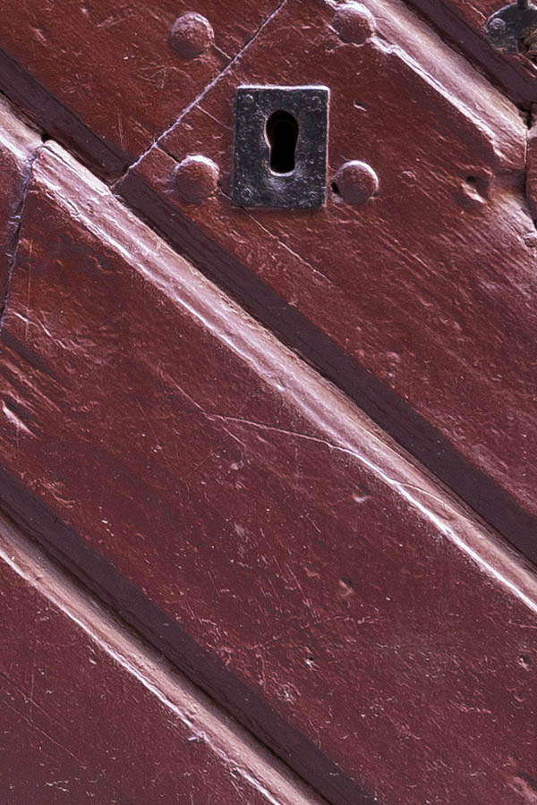 Photo 17742: Formed, red door of diagonally mounted boards
