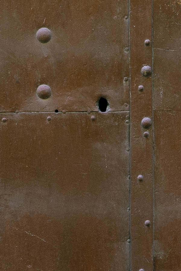 Photo 17774: Worn, brown double door made of horizontal strips